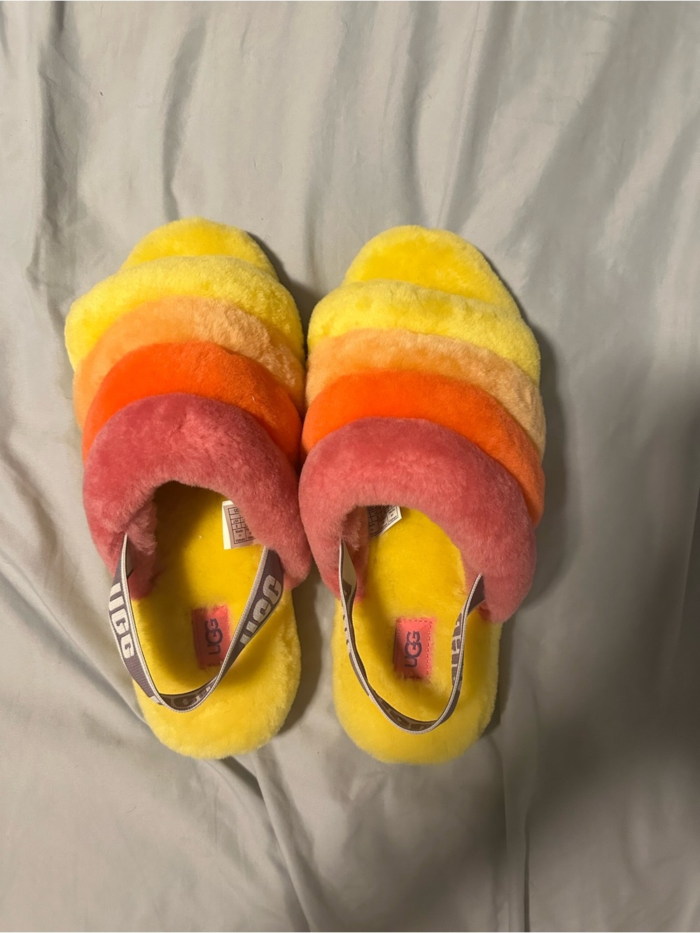 UGG Women’s Fuzzy Slide Slippers in Yellow, Orange & Pink